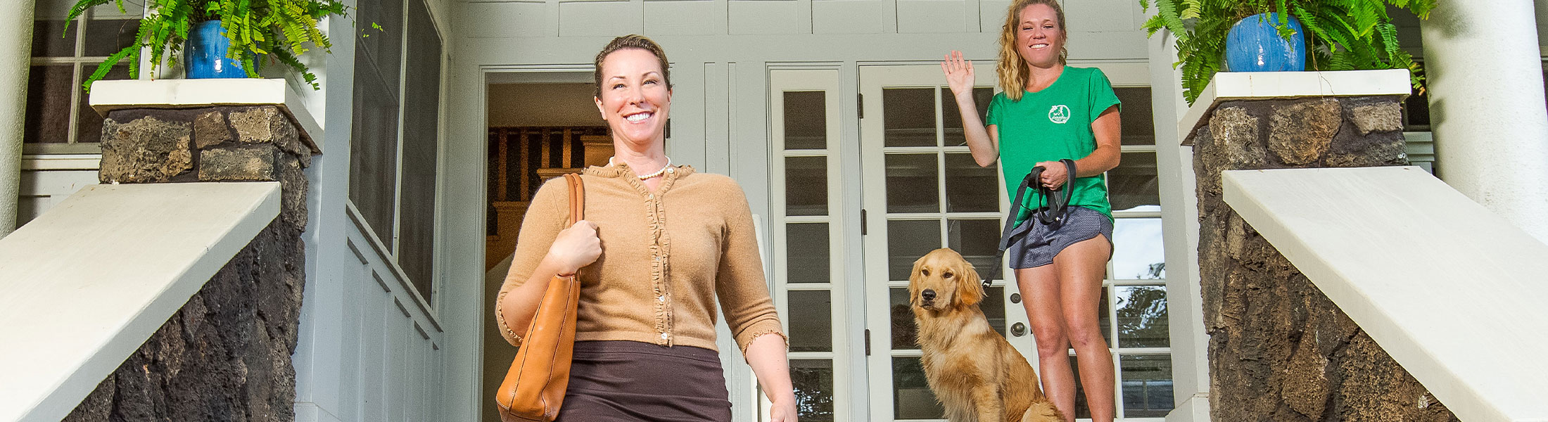 image of woman leaving dog at private boarding.